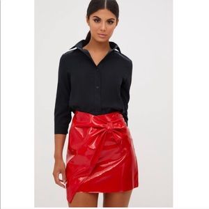 Red mini skirt with bow